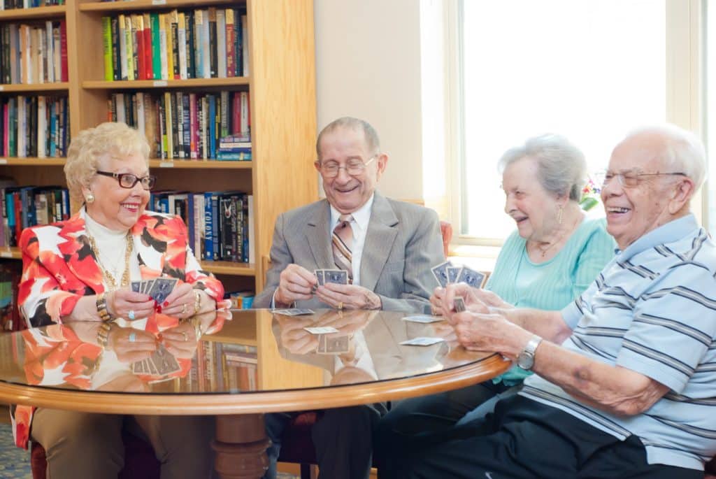 Seniors Playing Cards at the Timbers