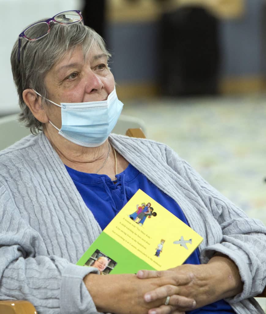 Geri Martinez Timbers of Shorewood resident listens to authors from the WriteOn club at Timbers of Shorewood 