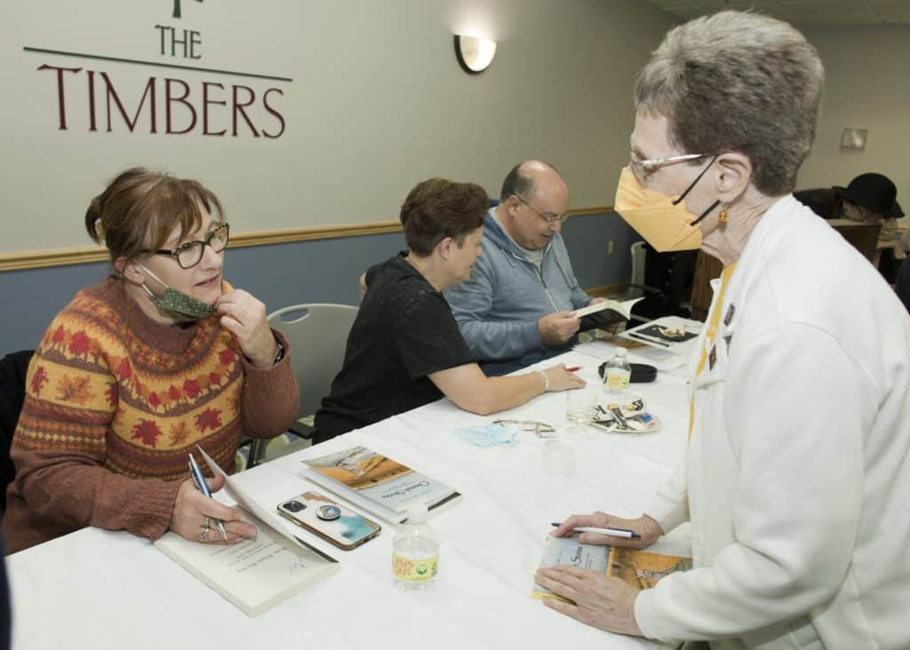 Author Holly Coop meets Timbers of Shorewood resident