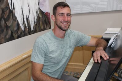 Caleb Larson at the Piano in the Timbers