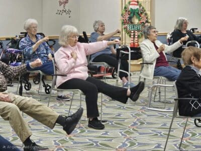 Seniors at the Timbers of Shorewood in the Seated Tai Chi class.