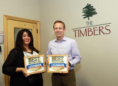 Sheila Albor, Director of Marketing and Kevin Young, Executive Director at Timbers of Shorewood with U.S. News Best Independent and Best Assisted Living Awards on Tuesday, April 14, 2026, in Shorewood, Ill.